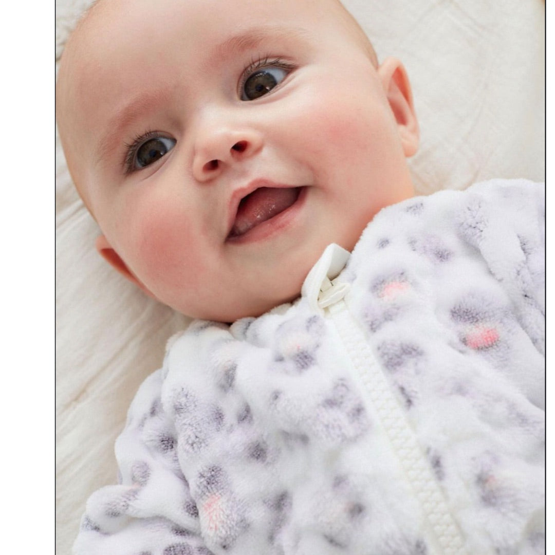 White Leopard Unisex Fleece Sleepsuit.