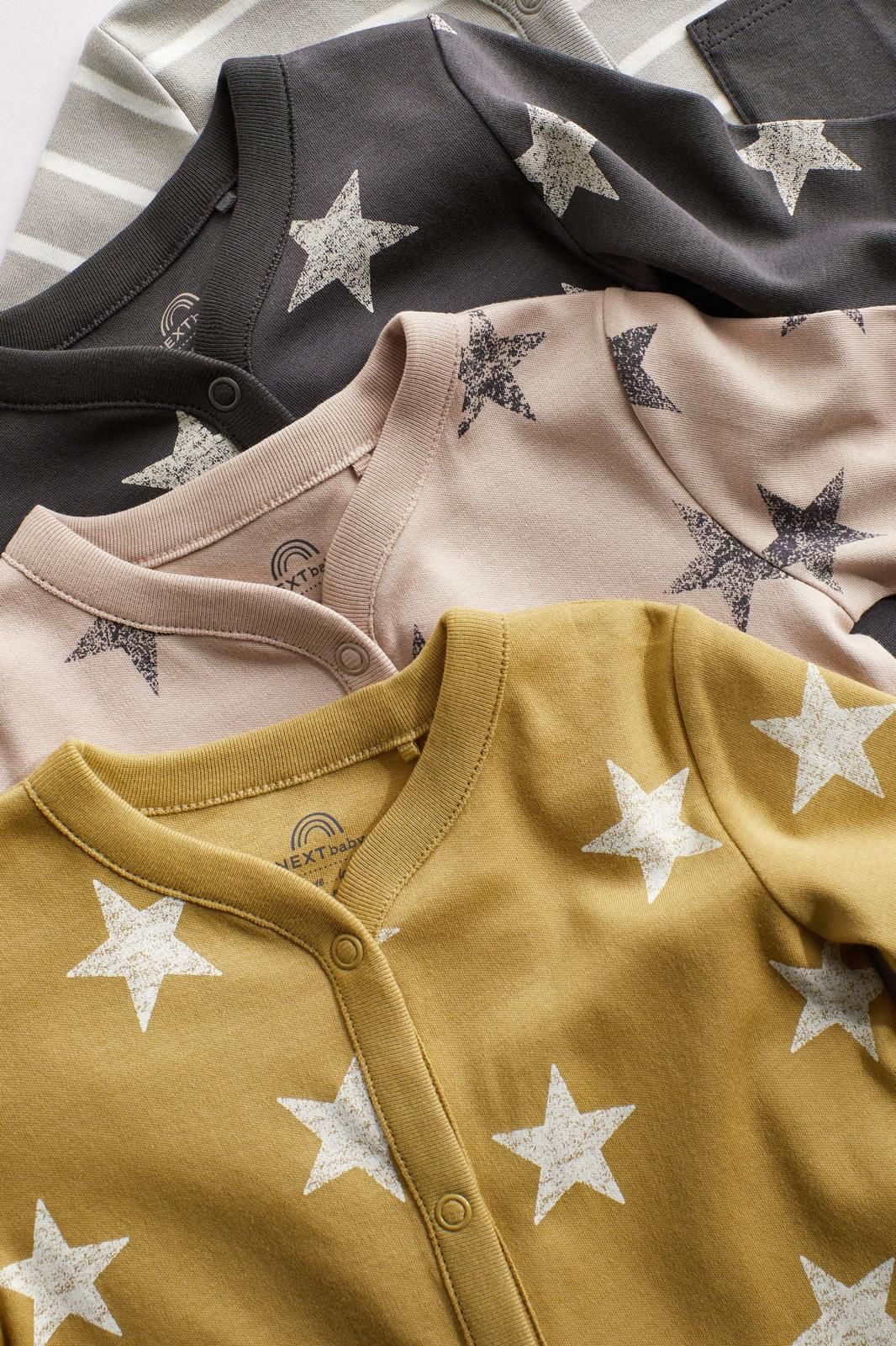 Multi Star Sleepsuits.