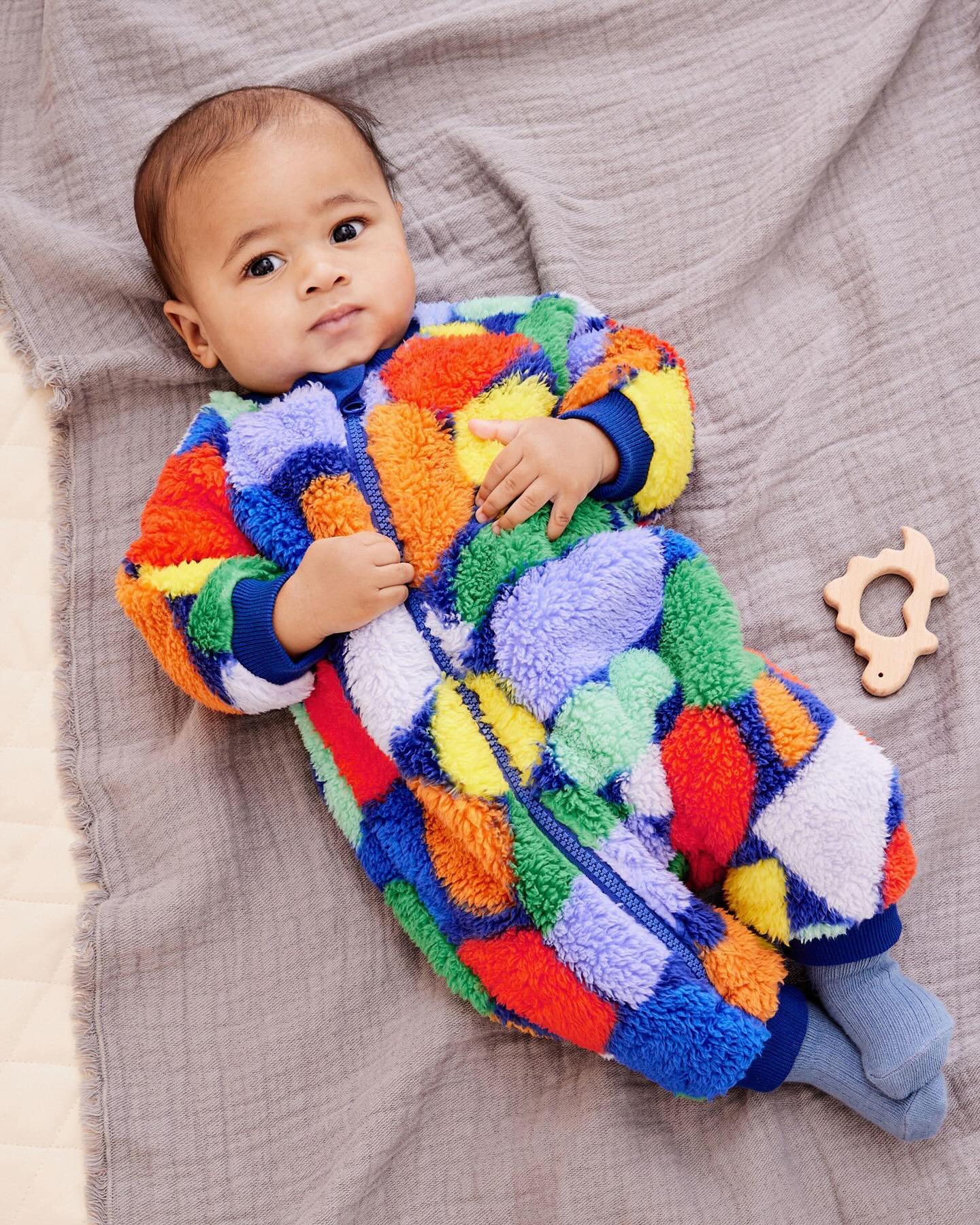 Multi Color Fleece Footless Zip Romper.