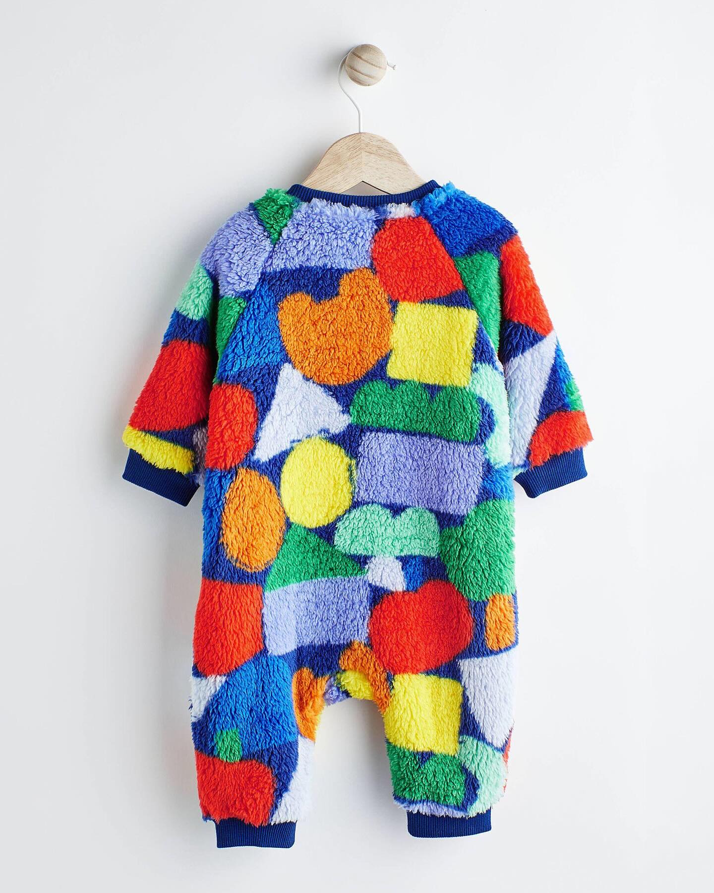 Multi Color Fleece Footless Zip Romper.