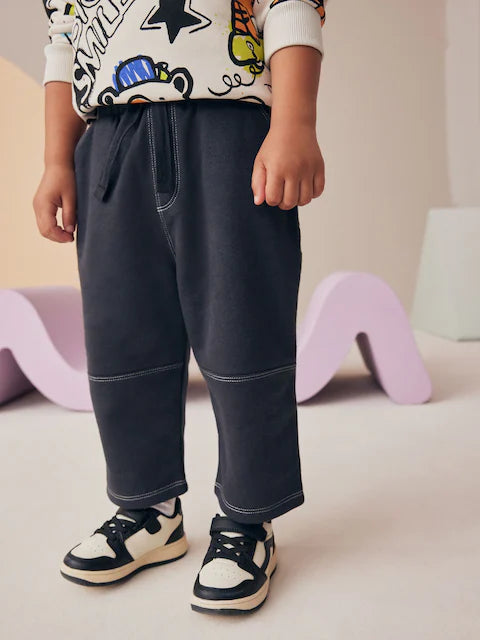 White Graffiti Character Hoodie and Carpenter Joggers Set