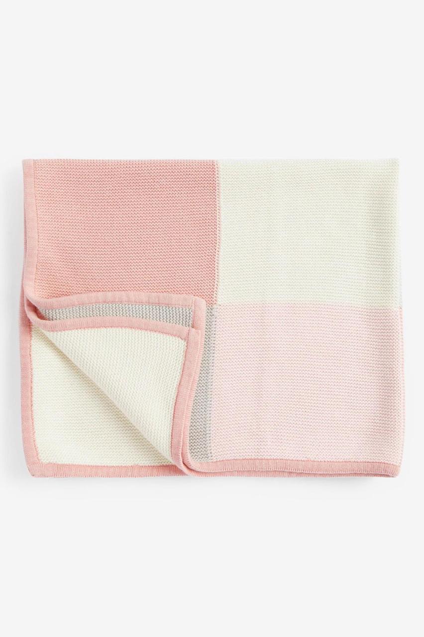 Pink knitted Blanket.